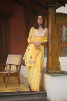 Yellow cotton baawan buti saree