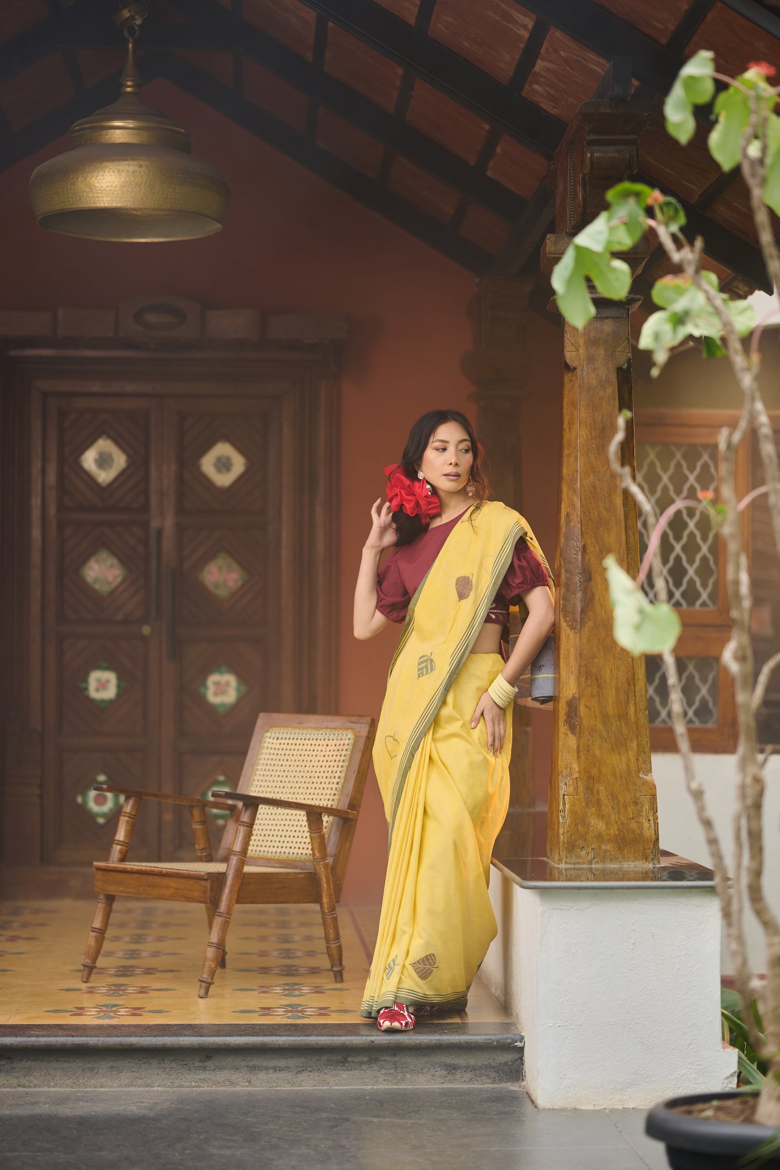 Yellow and blue cotton baawan buti saree