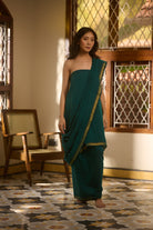 Mul cotton zari border green saree
